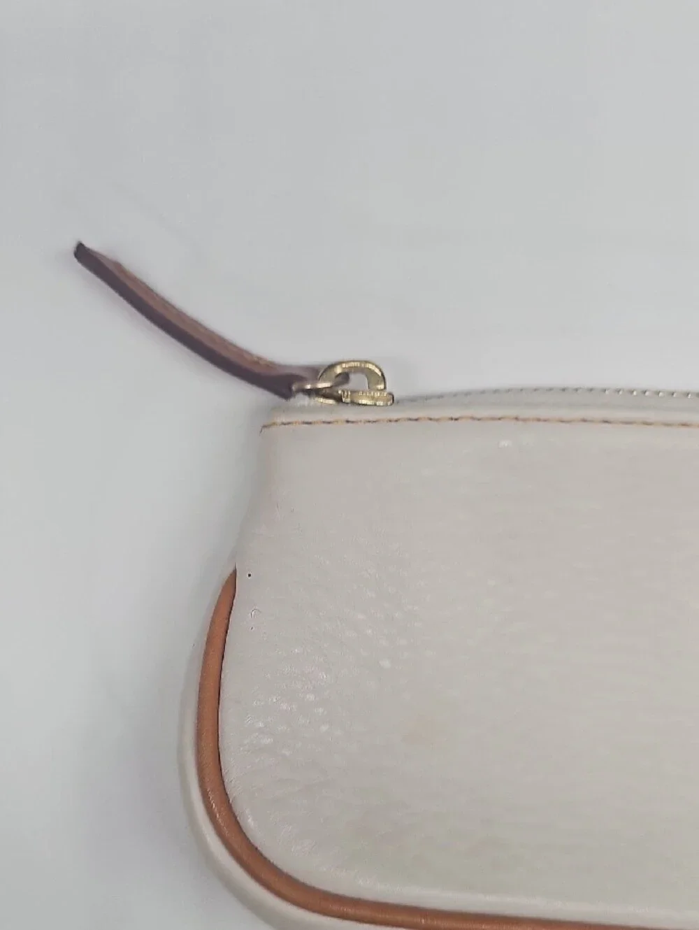 Dooney & Bourke Cream Leather Pouch